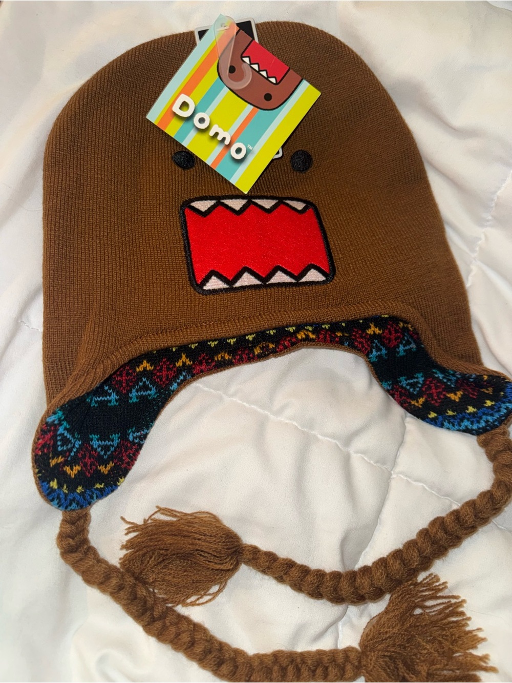 Domo Brown Knit Earflap Hat with Character Face